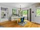 Bright and airy office featuring hardwood floors, ample natural light, and modern furnishings at 255 Emerald Lake Dr, Fayetteville, GA 30215