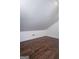 Spacious attic featuring hardwood floors, shiplap walls, and a sloped ceiling at 211 Hogan Coweta Rd, Hogansville, GA 30230