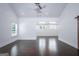 Bright living room featuring vaulted ceilings and hardwood floors at 211 Hogan Coweta Rd, Hogansville, GA 30230