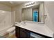 Bathroom featuring a shower-tub combination, modern sink and vanity, complete with a large mirror at 1392 Worcester Trl, Mcdonough, GA 30253
