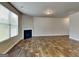 The living room features attractive hardwood flooring and a cozy fireplace at 1392 Worcester Trl, Mcdonough, GA 30253