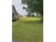 Spacious backyard with a shed and plenty of green space at 10 Nicole Ct, Covington, GA 30016