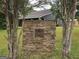 Stone sign for Bethany Ridge community, framed by mature trees at 10 Nicole Ct, Covington, GA 30016