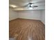 Open living room with hardwood style floors at 10 Nicole Ct, Covington, GA 30016
