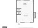 Layout of the first floor showing living room, kitchen, and staircase at 1590 Sw Cherry Hill Ln, Conyers, GA 30094