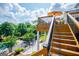 Multi-level backyard with steps, lush lawn, mature trees and an in-ground pool at 1745 Stripling Chapel Rd, Carrollton, GA 30116