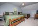 Comfortable bedroom with two full beds and a ceiling fan at 1745 Stripling Chapel Rd, Carrollton, GA 30116