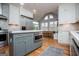 Stylish kitchen with an island, stainless steel appliances, white cabinets, and an eat-in kitchen nook at 1745 Stripling Chapel Rd, Carrollton, GA 30116