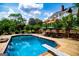Beautiful pool area with diving board, in ground pool, and outdoor lounge area at 1745 Stripling Chapel Rd, Carrollton, GA 30116