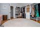 Large walk-in closet featuring custom shelving for shoes and clothes at 1745 Stripling Chapel Rd, Carrollton, GA 30116