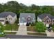 Aerial view of a suburban home featuring a manicured lawn and neighborhood setting at 1144 Simonton Hill Ct, Lawrenceville, GA 30045