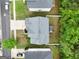 Aerial view of house with a large, private backyard surrounded by mature trees at 1144 Simonton Hill Ct, Lawrenceville, GA 30045