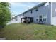 Spacious backyard with lush lawn, perfect for outdoor activities and gatherings, including a gazebo at 1144 Simonton Hill Ct, Lawrenceville, GA 30045