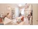 Elegant dressing room features a vanity table, shelving, and chic decor for a luxurious experience at 1144 Simonton Hill Ct, Lawrenceville, GA 30045