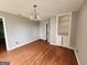 Charming dining room featuring hardwood floors and built-in shelving at 3581 S Hwy 100, Bowdon, GA 30108