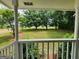 Enjoy breathtaking views of lush greenery from the home's charming, covered front porch at 3581 S Hwy 100, Bowdon, GA 30108