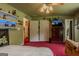Bedroom with overhead fan and closet door at 1170 Peeksville Rd, Locust Grove, GA 30248
