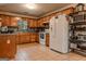 Well-equipped kitchen with tile floors and appliances at 1170 Peeksville Rd, Locust Grove, GA 30248