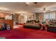 Spacious living room with cozy furnishings and carpet flooring at 1170 Peeksville Rd, Locust Grove, GA 30248