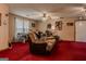 Comfortable living room with ceiling fan and sofa at 1170 Peeksville Rd, Locust Grove, GA 30248