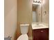 Bathroom features a dark wood vanity and large mirror at 4140 Butternut Pl, South Fulton, GA 30349