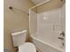 Bathroom with a white toilet and bath shower combo at 4140 Butternut Pl, South Fulton, GA 30349
