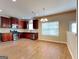 Modern kitchen featuring stainless steel appliances and wooden cabinets at 4140 Butternut Pl, South Fulton, GA 30349