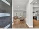 Open-concept entryway with hardwood floors flowing into a spacious living area at 209 Langshire Dr, Mcdonough, GA 30253