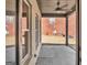 Covered patio features concrete flooring and a ceiling fan at 209 Langshire Dr, Mcdonough, GA 30253