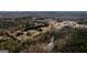 Expansive aerial view of a charming community nestled amidst lush greenery and serene natural surroundings at 79 Turner Dr, Mcdonough, GA 30252