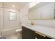 Modern bathroom featuring a tub, white subway tile, and vanity with gold hardware at 79 Turner Dr, Mcdonough, GA 30252