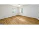 Bedroom featuring new floors, a ceiling fan and ample natural light at 79 Turner Dr, Mcdonough, GA 30252