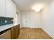 Well-lit kitchen with modern finishes, stainless steel appliances and two-tone cabinets at 79 Turner Dr, Mcdonough, GA 30252