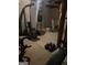 Basement gym featuring free weights, bench, treadmill, punching bag and weight machine at 171 Galesburg Dr, Lawrenceville, GA 30044