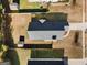 Aerial view of the property showcasing the home, spacious backyard, driveway, and neighborhood layout at 351 Autumn Lake Dr, Mcdonough, GA 30253