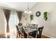 Dining room featuring a chandelier and sliding door at 351 Autumn Lake Dr, Mcdonough, GA 30253