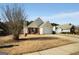 View of the home and lawn on a sunny day at 351 Autumn Lake Dr, Mcdonough, GA 30253