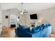 Bright living room featuring a vaulted ceiling and hardwood floors at 351 Autumn Lake Dr, Mcdonough, GA 30253