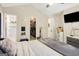 Spacious main bedroom offering vaulted ceilings, a walk-in closet, and plush decorative pillows at 351 Autumn Lake Dr, Mcdonough, GA 30253