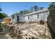 Brick patio with brick retaining wall in backyard at 1774 Campbellton Rd, Atlanta, GA 30311