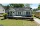Charming single-story home with large front porch and well-maintained lawn at 1774 Campbellton Rd, Atlanta, GA 30311