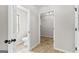 Neutral bathroom with a toilet and doorway to another room at 550 Davis Rd, Fayetteville, GA 30215
