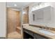 Modern bathroom with a glass shower, granite countertops, and vanity with sink at 550 Davis Rd, Fayetteville, GA 30215
