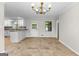 Bright dining area with large windows and an open floor plan at 550 Davis Rd, Fayetteville, GA 30215
