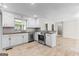 Modern kitchen with stainless steel appliances and granite countertops at 550 Davis Rd, Fayetteville, GA 30215