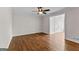 Cozy living room with hardwood floors, neutral walls and ample natural light at 550 Davis Rd, Fayetteville, GA 30215