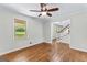 Bright living room with views of the yard and staircase access at 550 Davis Rd, Fayetteville, GA 30215