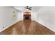 Inviting living room featuring a brick fireplace and large window views at 550 Davis Rd, Fayetteville, GA 30215