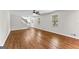Welcoming living room featuring hardwood floors and staircase views at 550 Davis Rd, Fayetteville, GA 30215