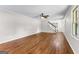 Bright living room with hardwood floors and staircase access at 550 Davis Rd, Fayetteville, GA 30215